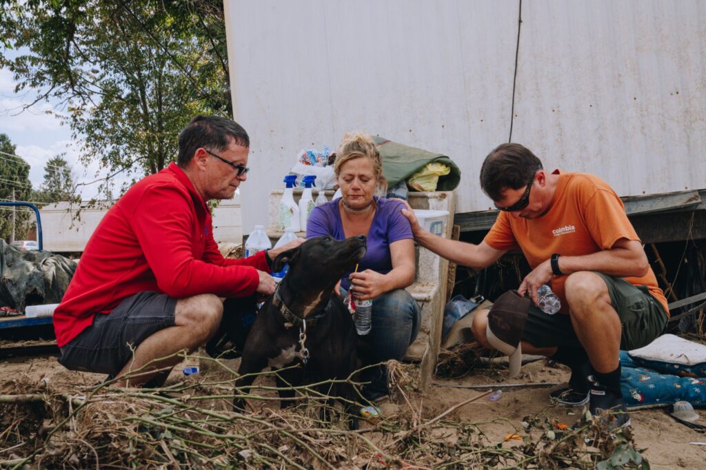 Mercy Chefs praying for woman in the aftermath of Hurricane Helene