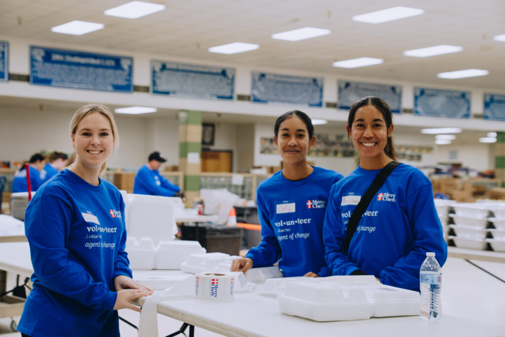 Shelby Valley High School students volunteering to prepare meals for flood victims in Kentucky.