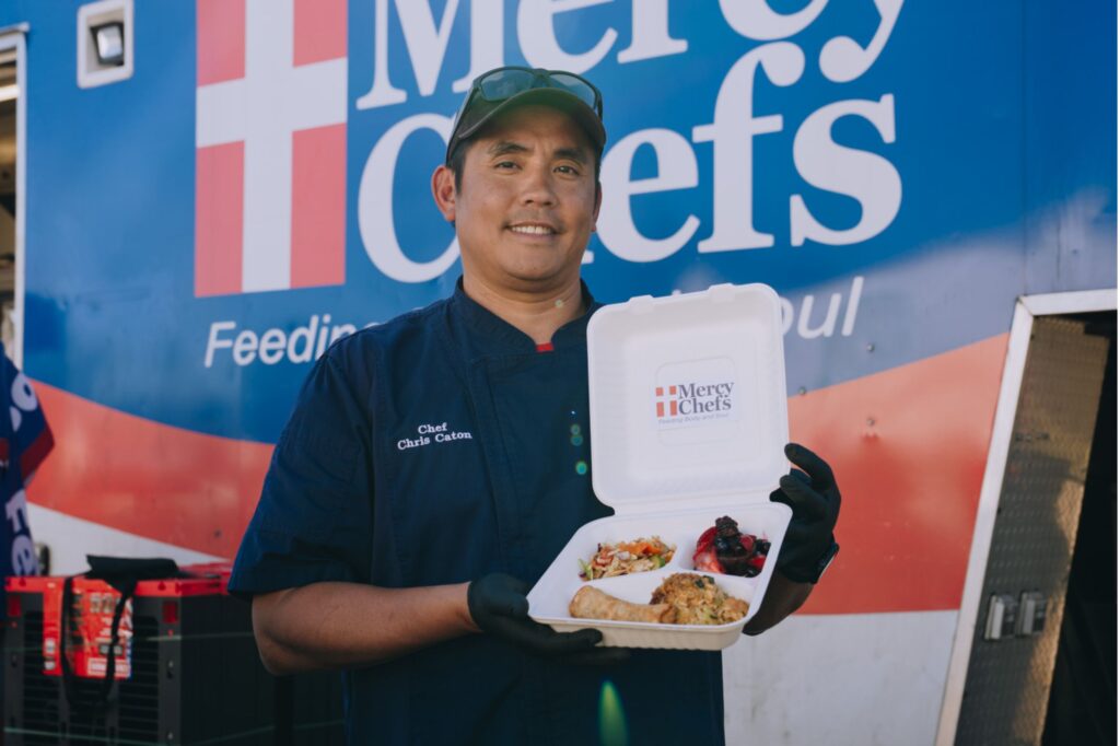 Chef Chris holding our first meal in response to the Mississippi tornadoes.