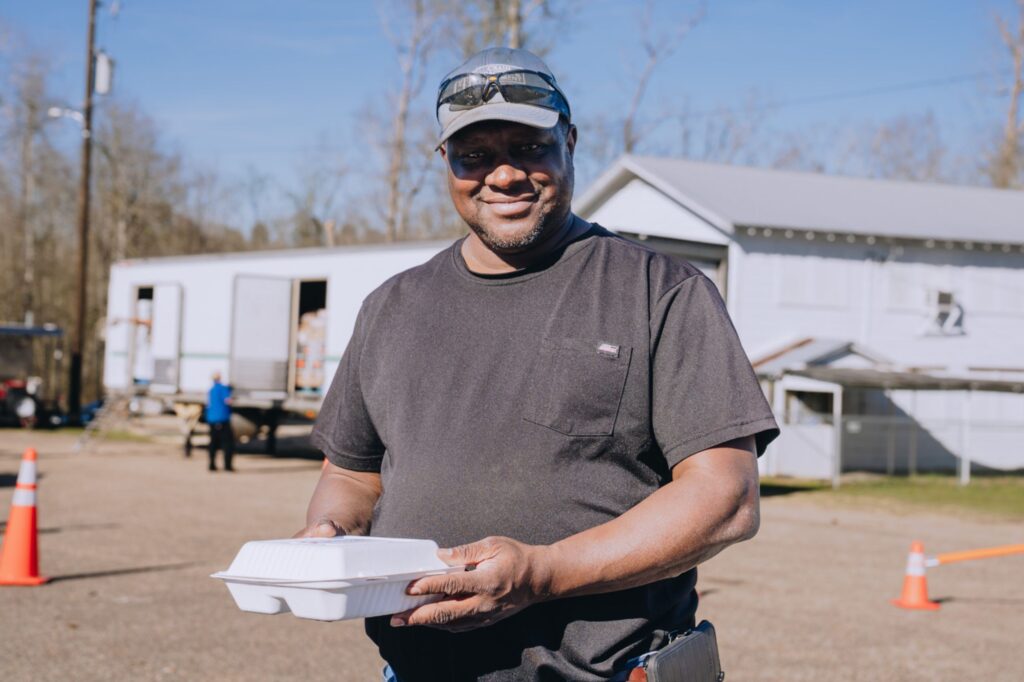 A tornado victim receiving a Mercy Chefs meal