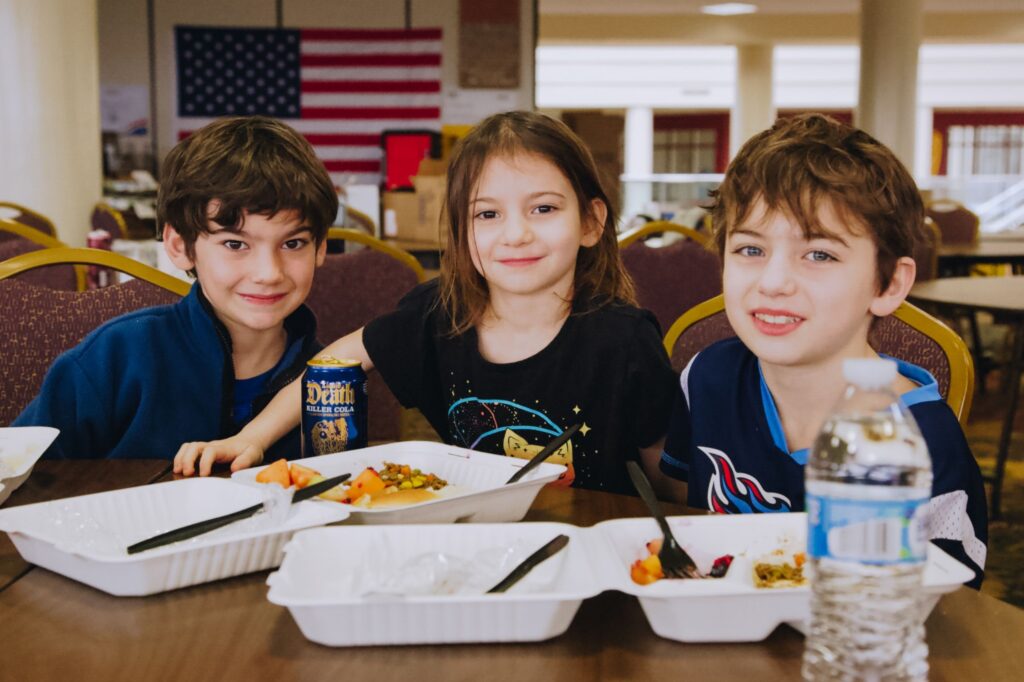 Children eating meals at Mercy Chefs' Nashville Community Kitchen