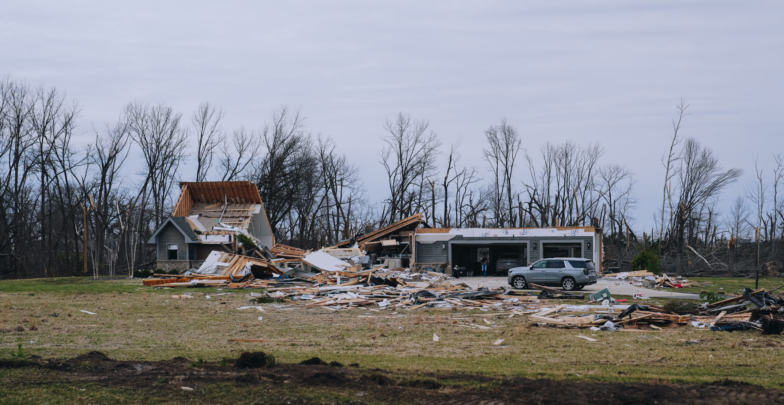 A tornado-damaged home and debri in Kankakee, IL