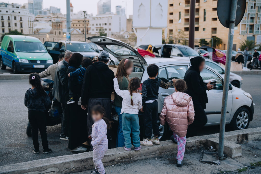 A group gathers to receive Mercy Chefs' meals in Lebanon
